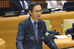 越南常驻联合国代表团团长杜雄越大使在会上发表讲话。图自越通社