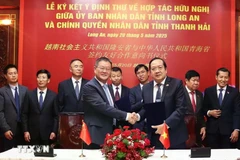 签约仪式。图自越通社