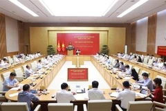 政府党委第二次会议现场。图自越通社