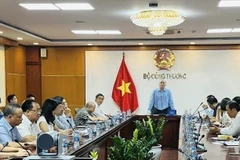 工贸部贸易促进局局长武伯富主持会议。图自越通社