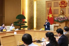 越南政府总理范明政在政府驻地主持召开越南数据平台发展会议。图自越通社