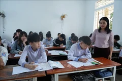 乂安省寿成初中学校的师生。图自越通社