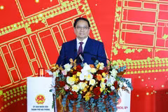越南政府总理范明政发表讲话。图自越通社