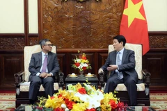 越南国家主席梁强会见印尼驻越大使丹尼•阿卜迪。图自越通社