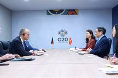 越南政府总理范明政会见德国总理弗里德里希·默茨。图自越通社