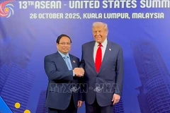 越南政府总理范明政会见美国总统特朗普。图自越通社