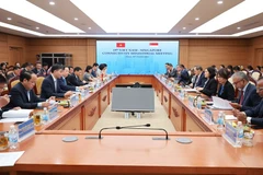 会议现场。图自越通社