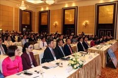 会议场景。图自越通社