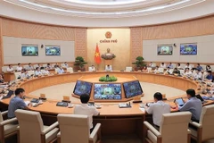 会议现场。图自越通社