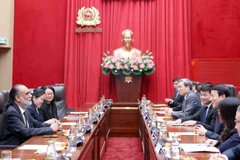 越共中央政治局委员、公安部部长梁三光大将会见联合国副秘书长、联合国秘书长技术特使阿曼迪普·辛格·吉尔。图自越通社