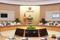 范明政总理主持召开政府会议 评估两级地方政权运行成效。图自越通社