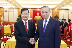 苏林总书记会见老挝人民革命党中央总书记、国家主席通伦·西苏里
