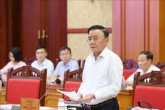 越共中央书记处常务书记陈锦秀主持越共十四大服务组织小组第四次会议。图自越通社