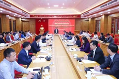 座谈会现场。图自越通社