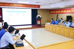 会议场景。图自越通社