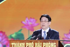 国家主席梁强发表讲话。图自越通社