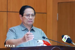 越共中央政治局委员、政府总理范明政发表讲话。图自越通社
