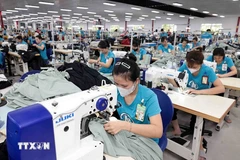 越南纺织服装业贸易顺差达近70亿美元。图自越通社