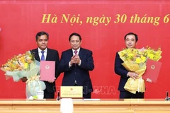 越南政府总理范明政任命两位省委书记担任副部长级职务。图自越通社