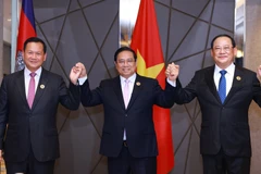 越南政府总理范明政、柬埔寨王国首相洪玛奈和老挝人民民主共和国总理宋赛·西潘敦。图自越通社