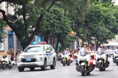 河内市公安机关推出交通分流疏导方案 保障《我自豪我是越南人》政论性文艺演出顺利举行。图自越通社
