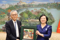 越南政府副总理范氏清茶与日本Erex集团董事长兼总经理本名均。图自VGP