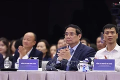 越南政府总理范明政在河内出席2025年越南民营经济全景（ViPEL）会议。图自越通社