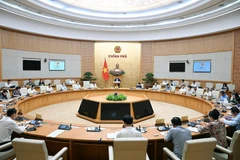 会议全景。图自越通社