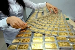 国家银行将与公安部和有关部门协调管理黄金市场。图自Vietnam+