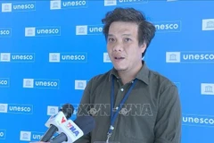 联合国教科文组织信息中心副总经理丁德煌。图自越通社