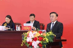 越共中央政治局委员、中央书记处常务书记陈锦秀发表讲话。图自越通社