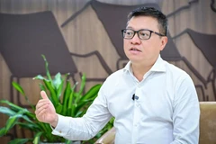 越共中央委员、中央宣教与民运部副部长、越南记者协会主席、《人民报》总编辑黎国明。图自越通社