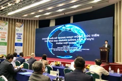 会议场景。图自越通社