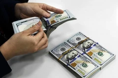8月18日上午越南国内各家商业银行美元和人民币价格小幅波动。图自互联网