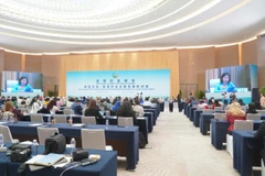 越共中央委员、越南妇女联合会主席阮氏线率团出席峰会。图自越通社