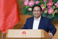 越南政府总理、2021-2026年任期国家竞赛奖励委员会主席范明政在河内主持召开该委员会第十三次会议。图自越通社