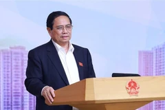 越南政府总理范明政发表讲话。图自越通社