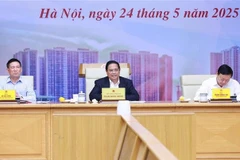 政府总理范明政发表讲话。图自越通社