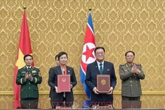 越南通讯社与朝鲜中央通讯社签署合作协议。图自越通社