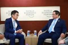 越南政府总理范明政会见东盟与东亚经济研究所（ERIA）所长渡边哲也（Tetsuya Watanabe）教授。图自越通社