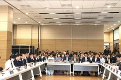 会议场景。图自越通社