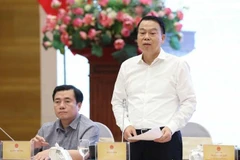 财政部副部长阮德之发表讲话。图自越通社