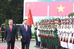 越共中央总书记苏林隆重举行仪式 欢迎中共中央总书记、中国国家主席习近平访越