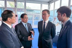 越南政府总理范明政会见中国国家副主席韩正。图自越通社