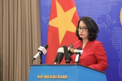 越南外交部发言人范秋姮主持外交部例行记者会。图自越通社