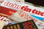 越通社千余份出版物登陆“河内五门口”观光列车 开启文化与资讯之旅