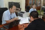6月30日将举行两级地方政府组织模式正式运行发布会。图自越通社