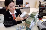 诸多银行实施信贷措施，为企业提供支持。图自越通社