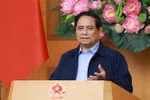 越南政府总理范明政发表讲话。图自越通社