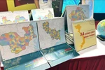 名为“神龙三十四片的”2026年桌面日历。图自越通社